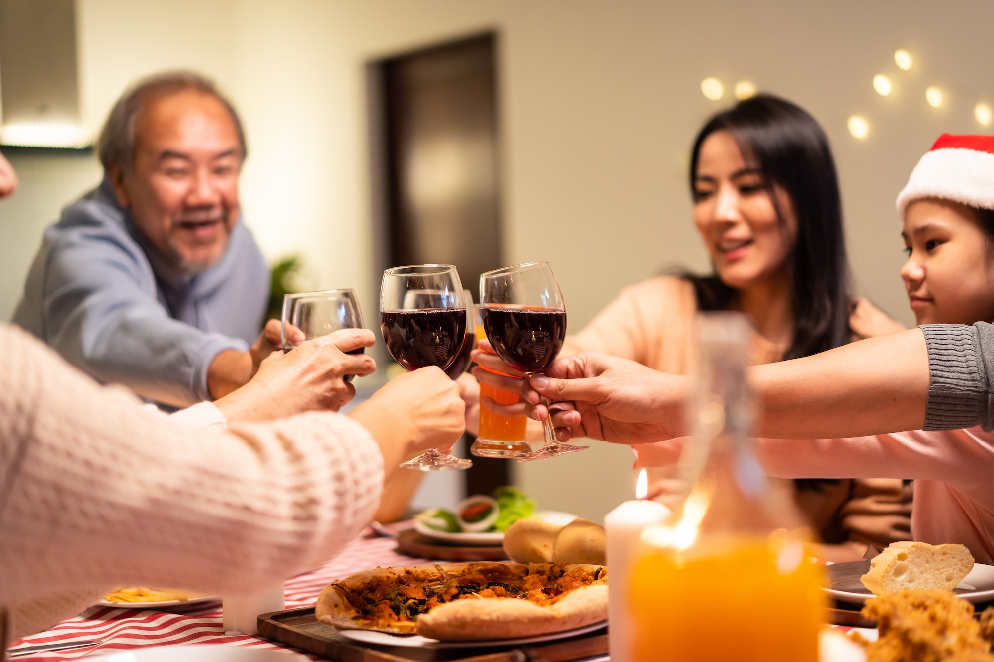 Happy family time and relationship, Asian big family having christmas eating food together at home.