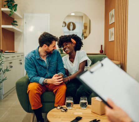 Diverse couple on a therapy session in a psychologist office